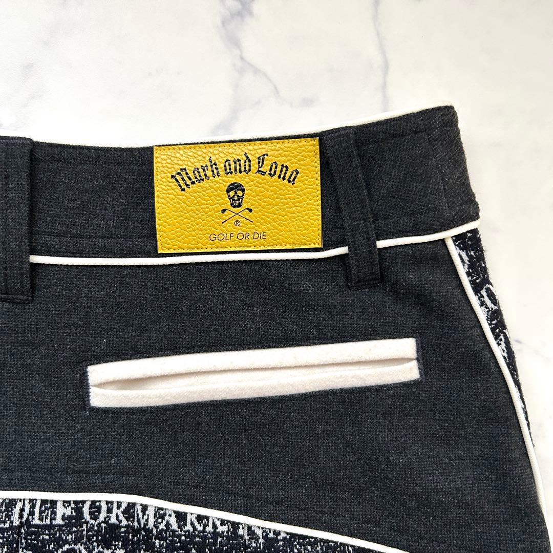 マークアンドロナ 近年モデル プリーツスカート インナー付き 総柄 レザーロゴ