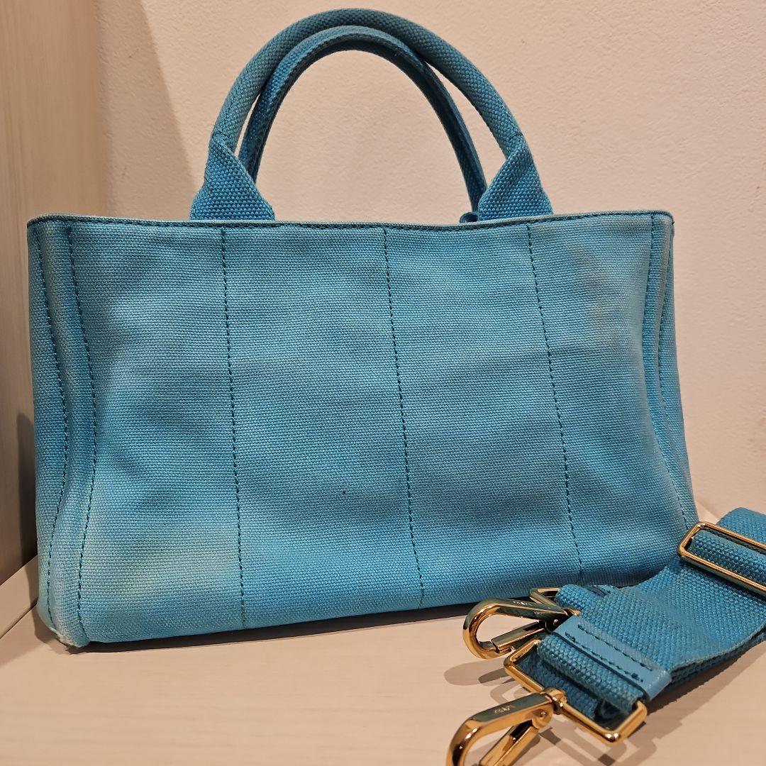 tomo です PRADA　カナパSサイズ ターコイズ
