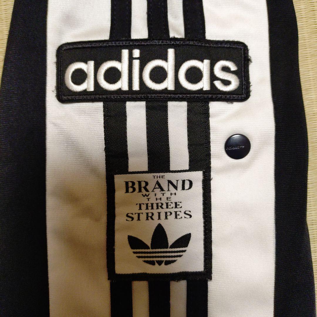 adidas ストライプジャージパンツ スナップボタン付き