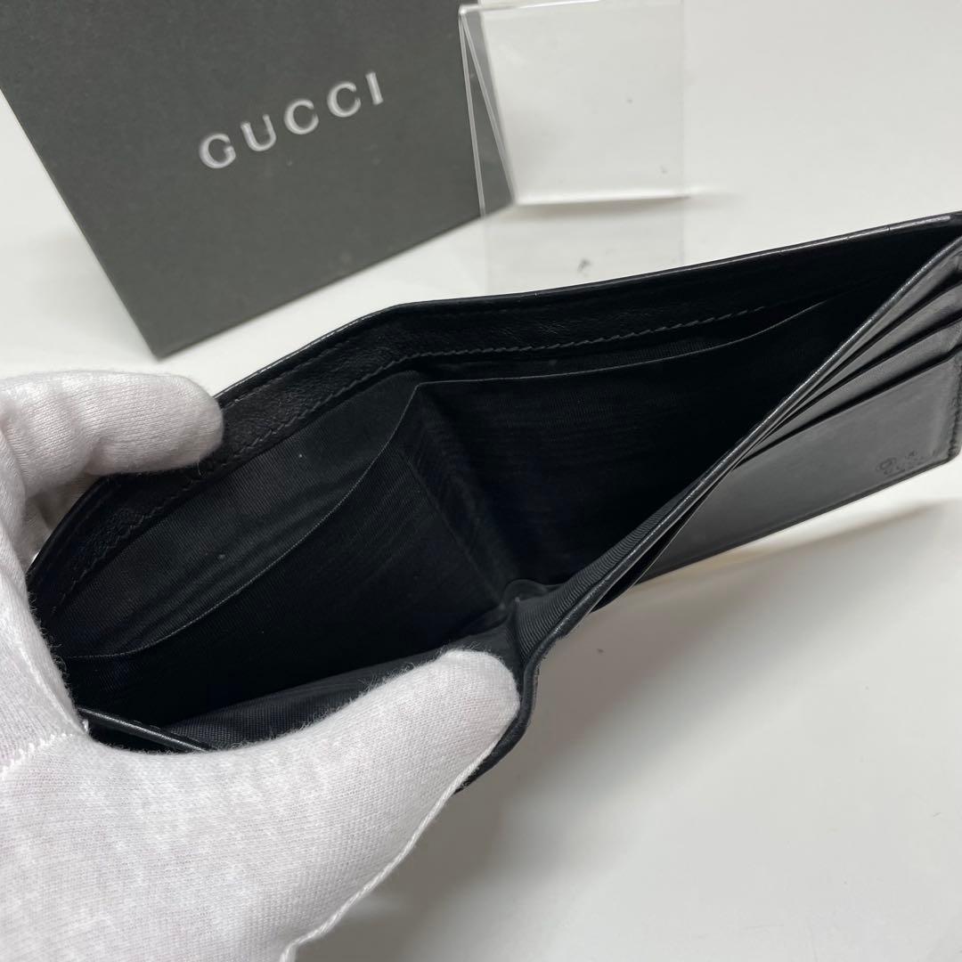 プ*丼様 GUCCI マイクログッチシマ　ブラックレザー 二つ折り札入れ
