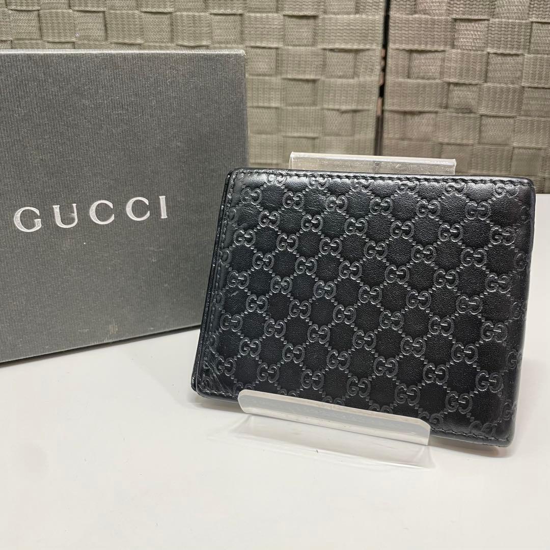 プ*丼様 GUCCI マイクログッチシマ　ブラックレザー 二つ折り札入れ