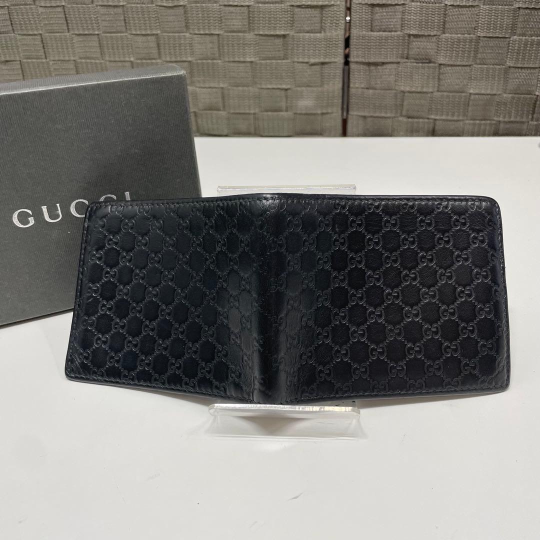 プ*丼様 GUCCI マイクログッチシマ　ブラックレザー 二つ折り札入れ