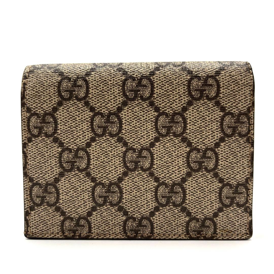 美品 グッチ 二つ折り財布 GGスプリーム 目 唇 バイカラー レディース