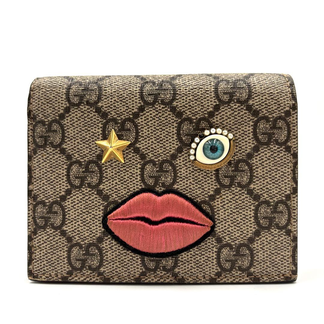 美品 グッチ 二つ折り財布 GGスプリーム 目 唇 バイカラー レディース