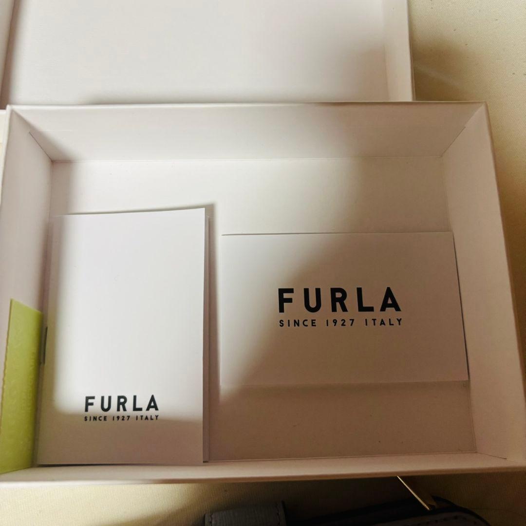 ゆ*う様 FURLA 二つ折り財布 ライトブルー