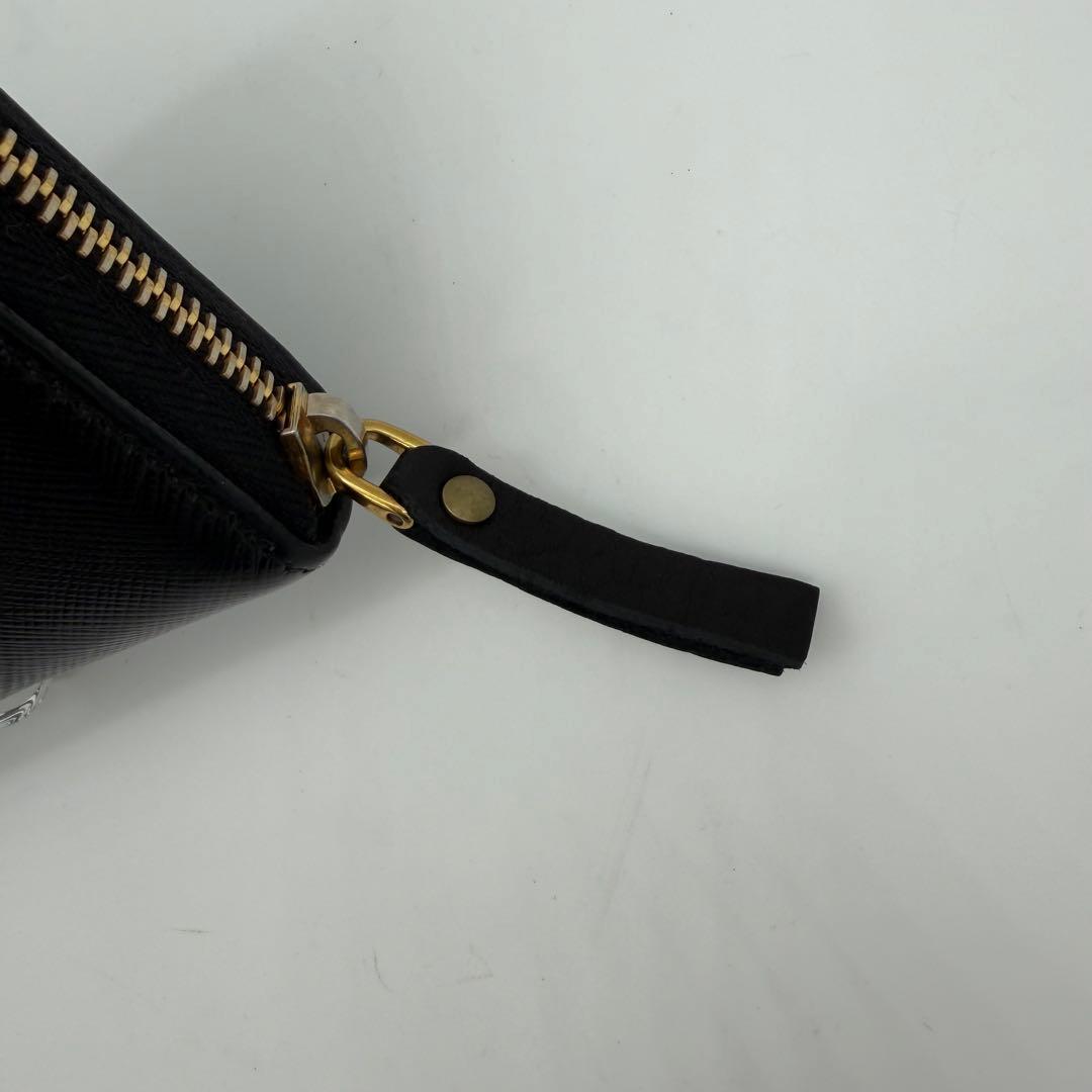 PRADA 長財布 ラウンドファスナー ロゴ金具 リボン サフィアーノレザー 黒