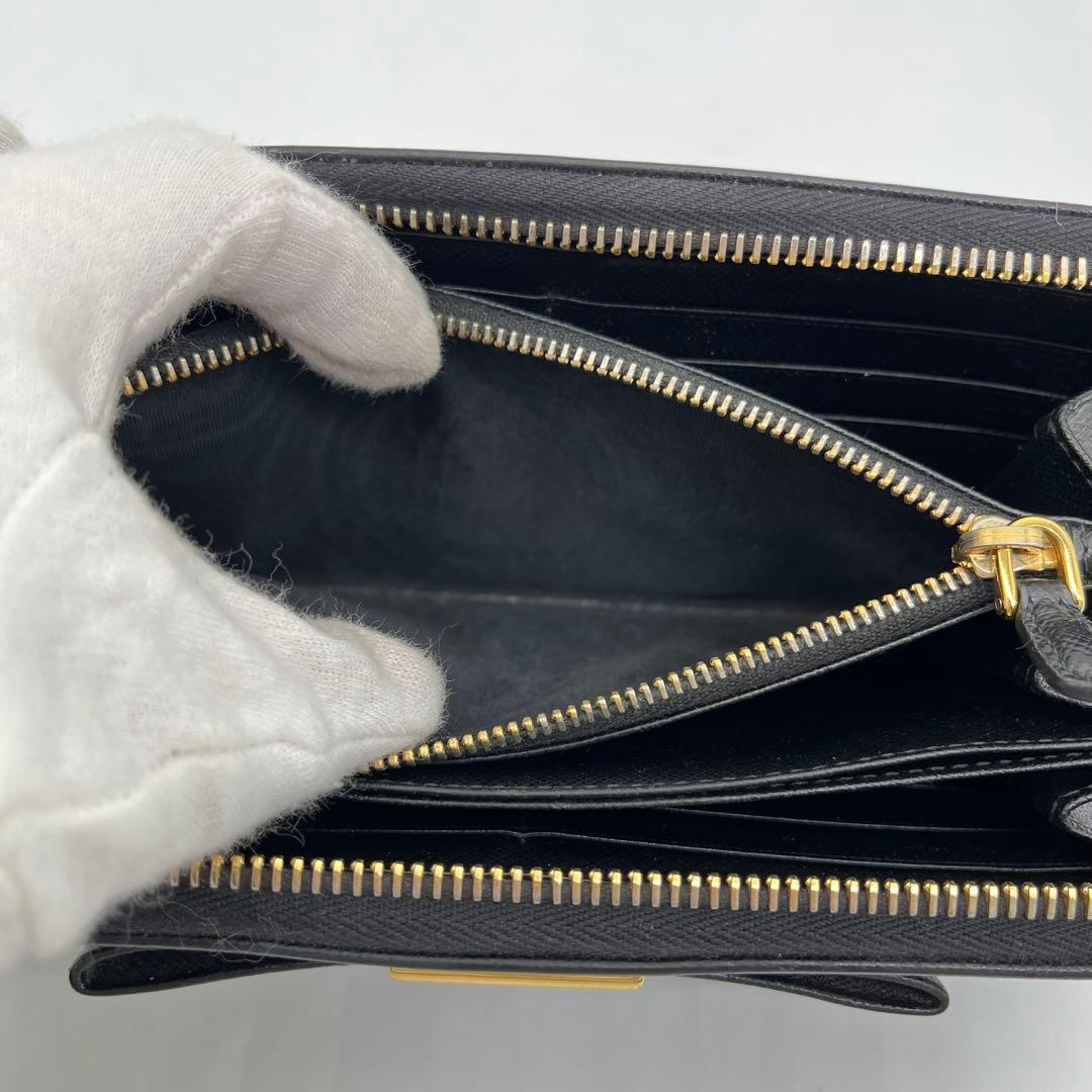 PRADA 長財布 ラウンドファスナー ロゴ金具 リボン サフィアーノレザー 黒