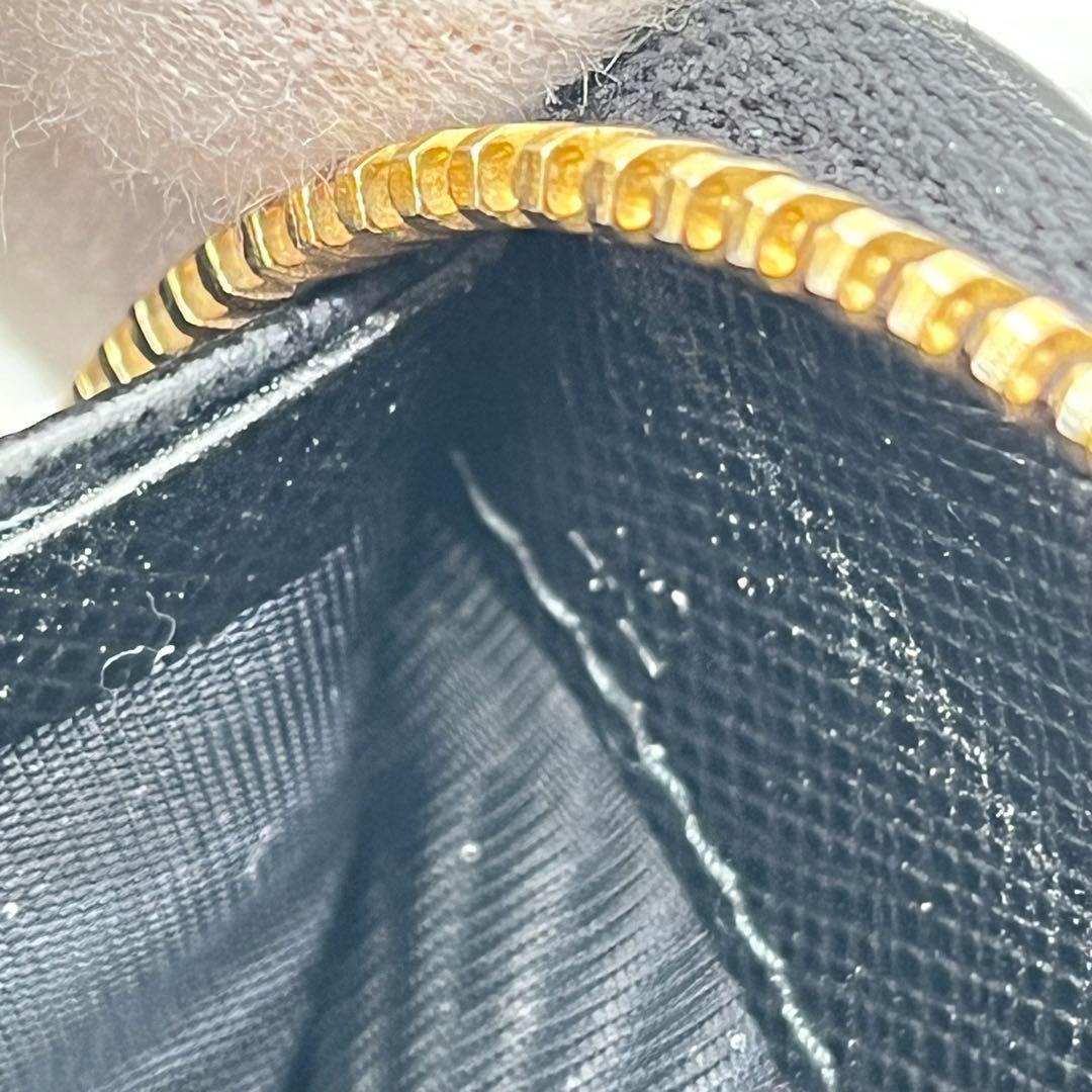 PRADA 長財布 ラウンドファスナー ロゴ金具 リボン サフィアーノレザー 黒