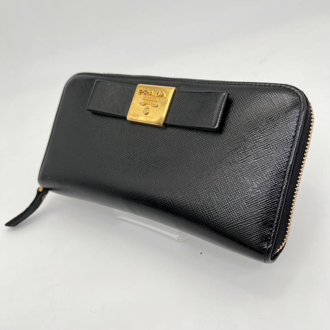 PRADA 長財布 ラウンドファスナー ロゴ金具 リボン サフィアーノレザー 黒