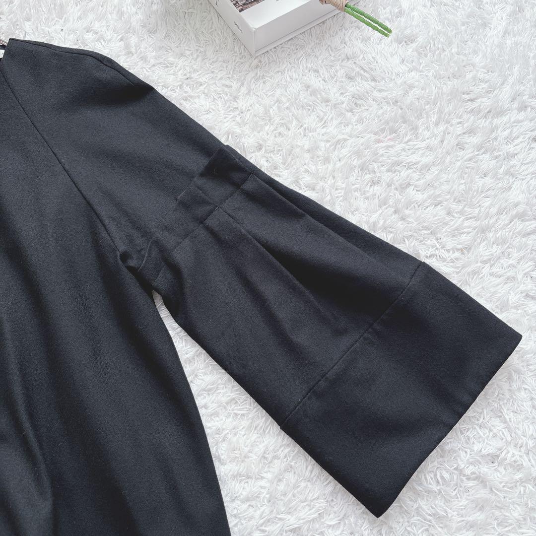 ADORE スーパー100 ストレッチサキソニーラグランフレアーブラウス