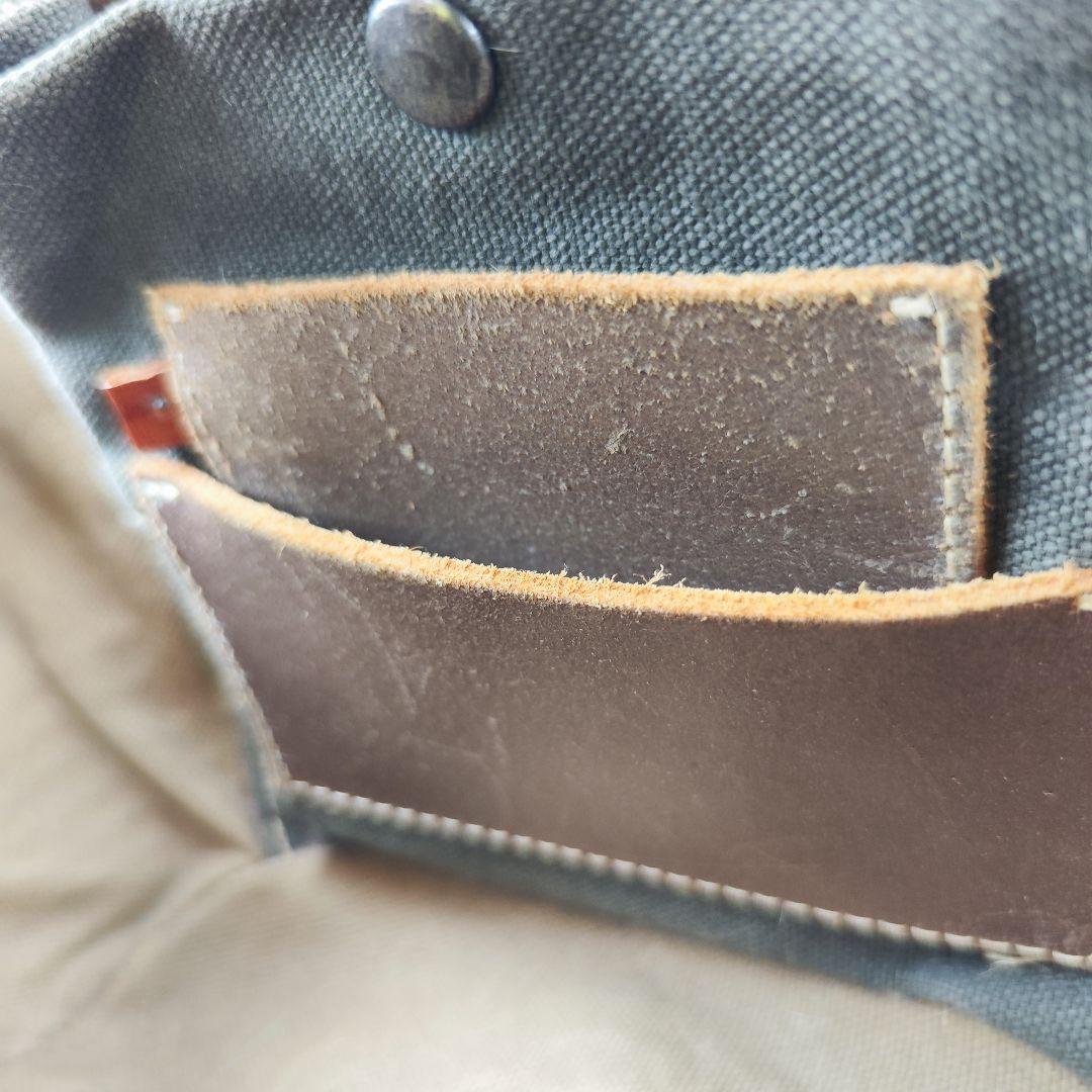 エバゴス カゴバッグ 扇型 レザー ラビットファー 鏡