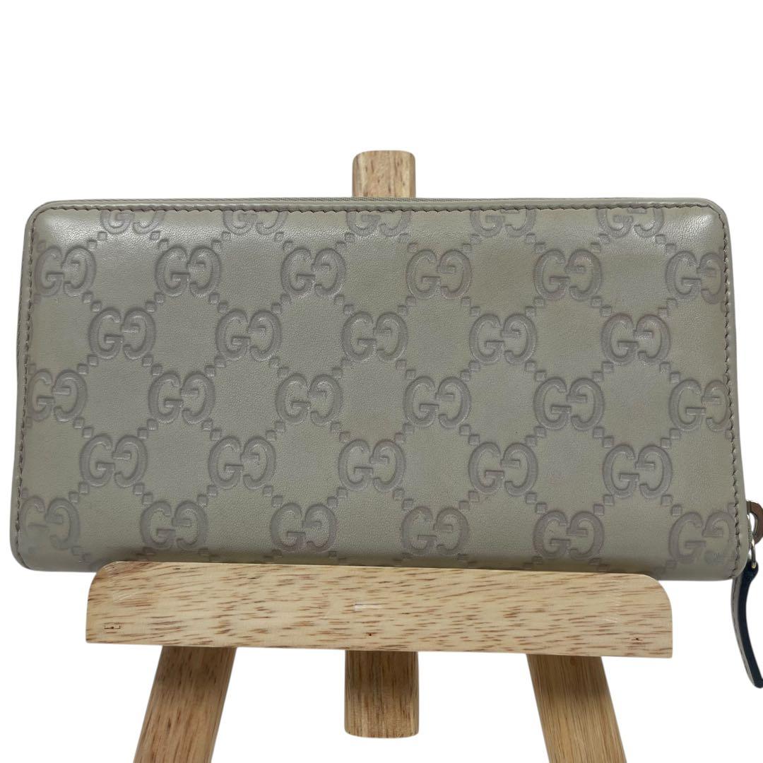 グッチ　長財布　GGシマレザー　ロゴプレート　ロゴ総柄　型押　ラウンドファスナー