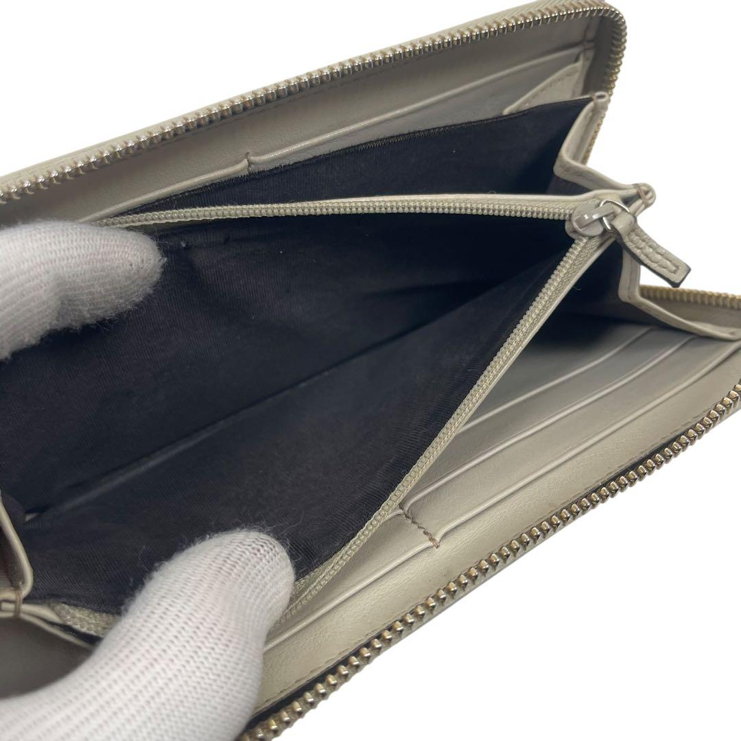 グッチ　長財布　GGシマレザー　ロゴプレート　ロゴ総柄　型押　ラウンドファスナー