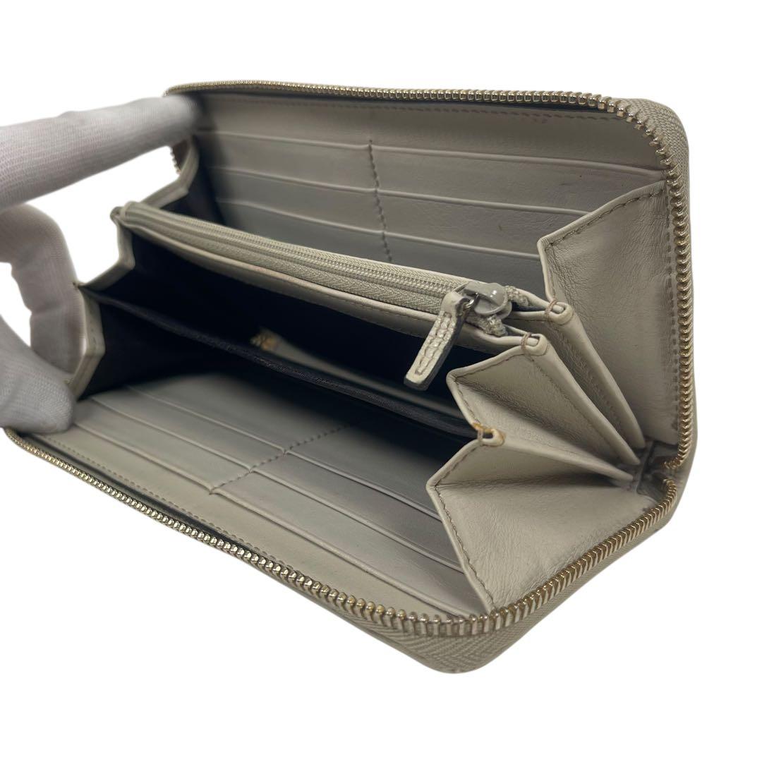 グッチ　長財布　GGシマレザー　ロゴプレート　ロゴ総柄　型押　ラウンドファスナー