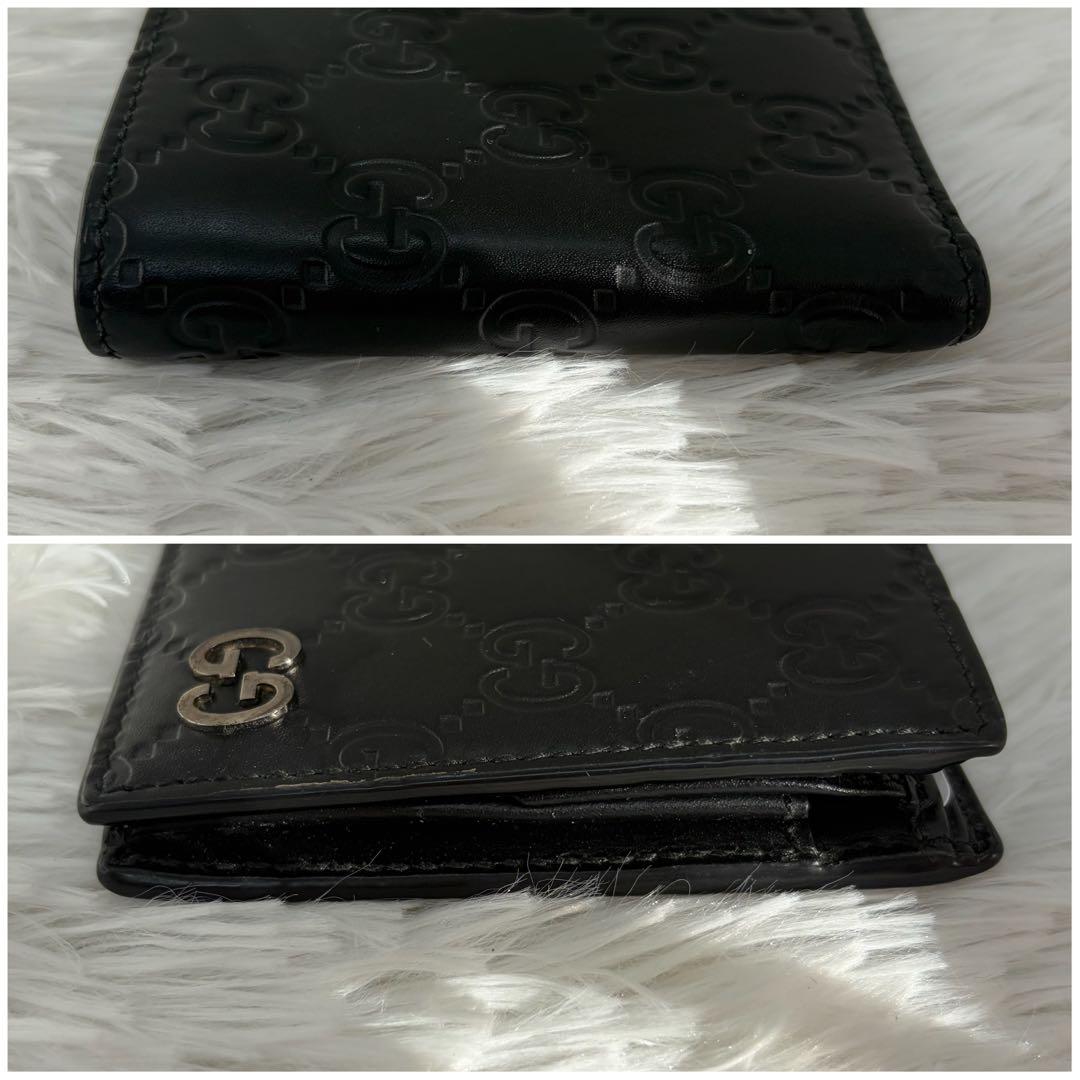 未使用級✨️ グッチ　二つ折り　シマ　小銭入れ　ドリアン　型押し　レザー　黒