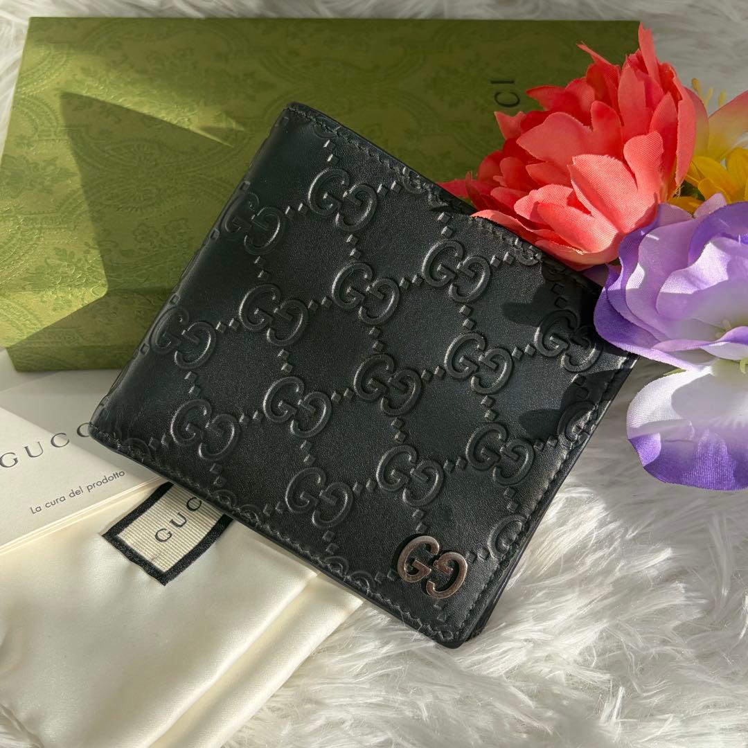 未使用級✨️ グッチ　二つ折り　シマ　小銭入れ　ドリアン　型押し　レザー　黒