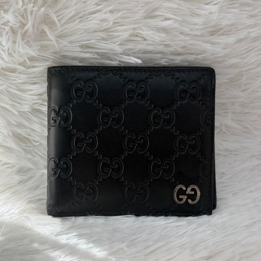 未使用級✨️ グッチ　二つ折り　シマ　小銭入れ　ドリアン　型押し　レザー　黒