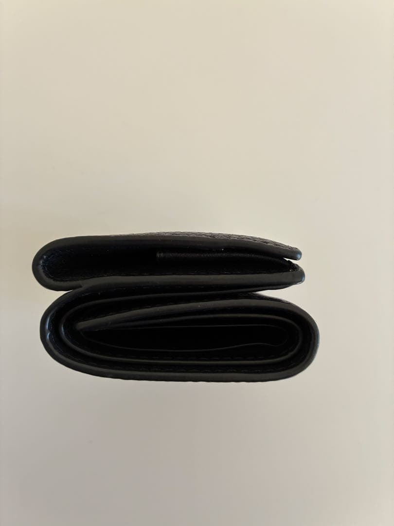 ひまわり　COACH ブラック 三つ折り財布