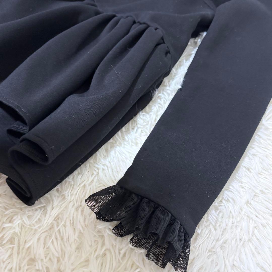 ツルバイマリコオイカワ Queenie ボンディングペピラムトップス free