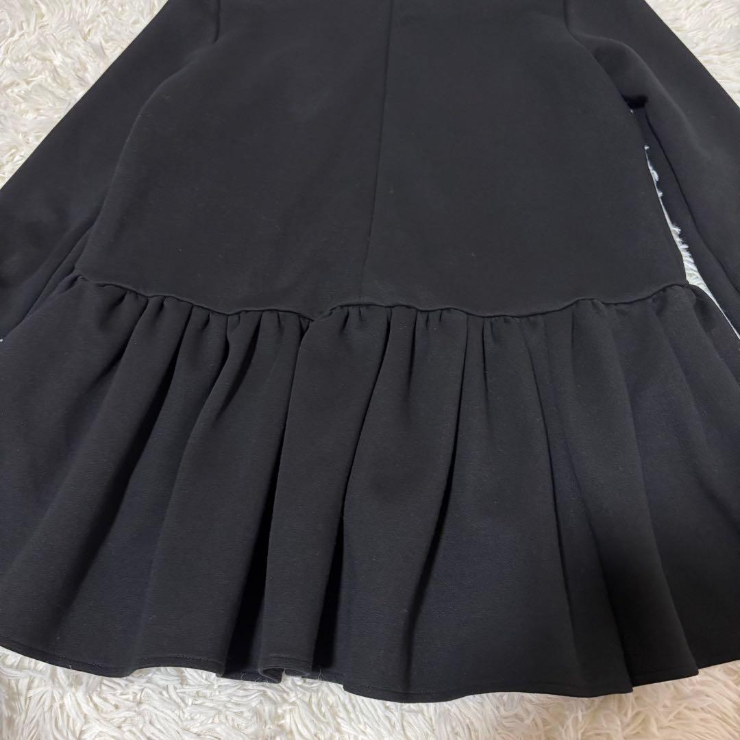 ツルバイマリコオイカワ Queenie ボンディングペピラムトップス free