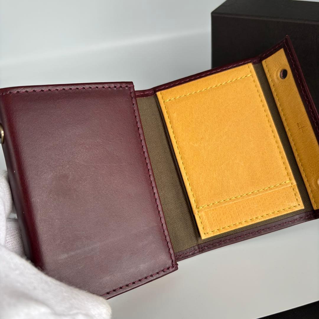 m+ エムピウ ミッレフォッリエⅡ P25 ワイン イエロー 二つ折り財布