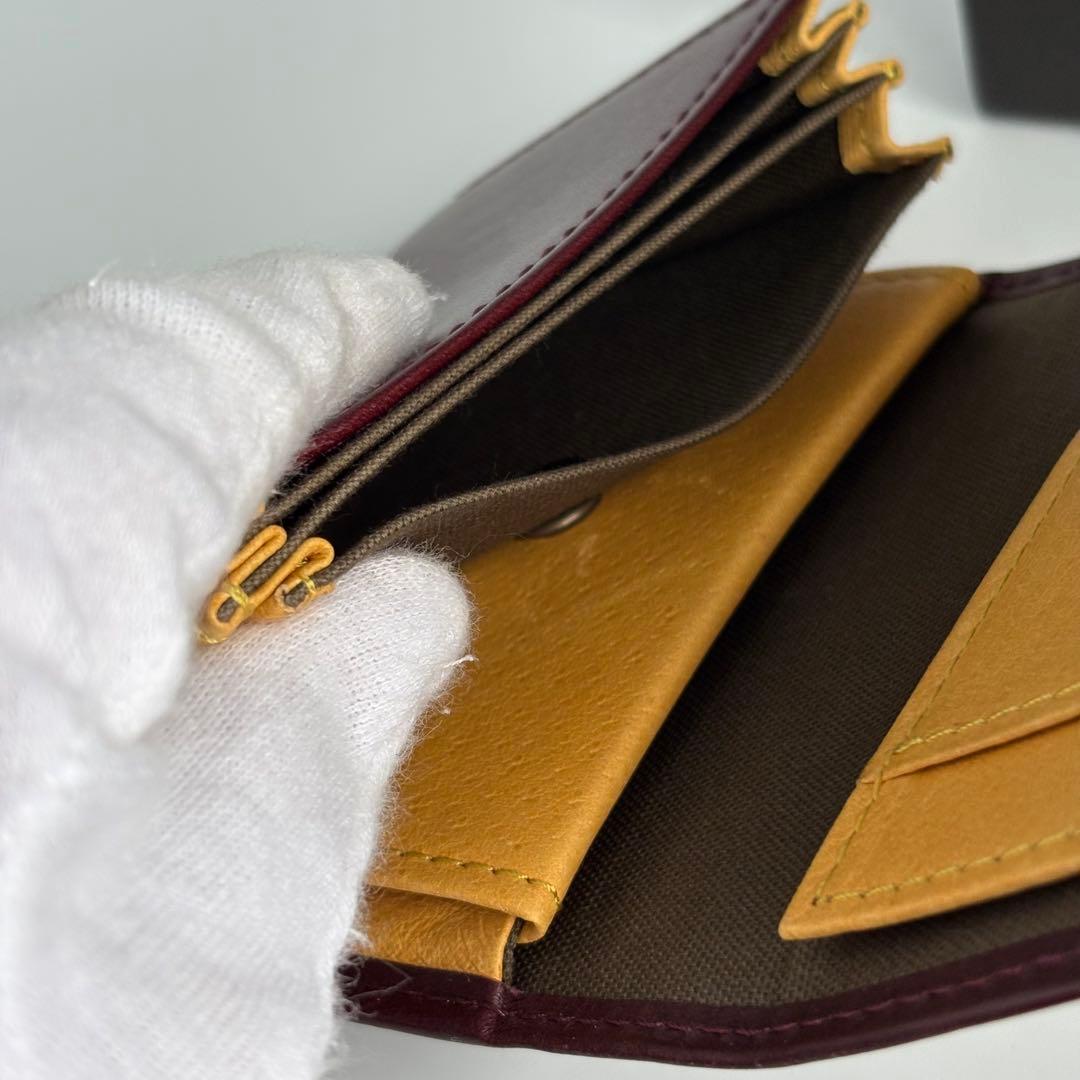 m+ エムピウ ミッレフォッリエⅡ P25 ワイン イエロー 二つ折り財布