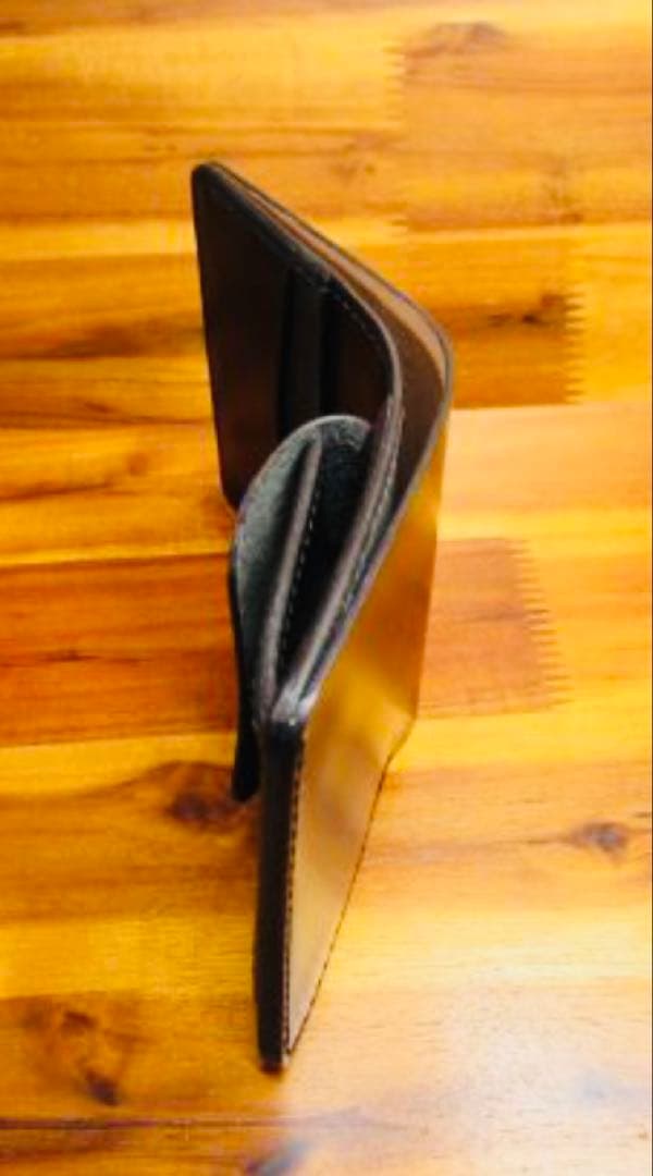 か*ん様 世界に１つ❗️新喜皮革 コードバン ブラック 黒 手縫い 二つ折り 栃