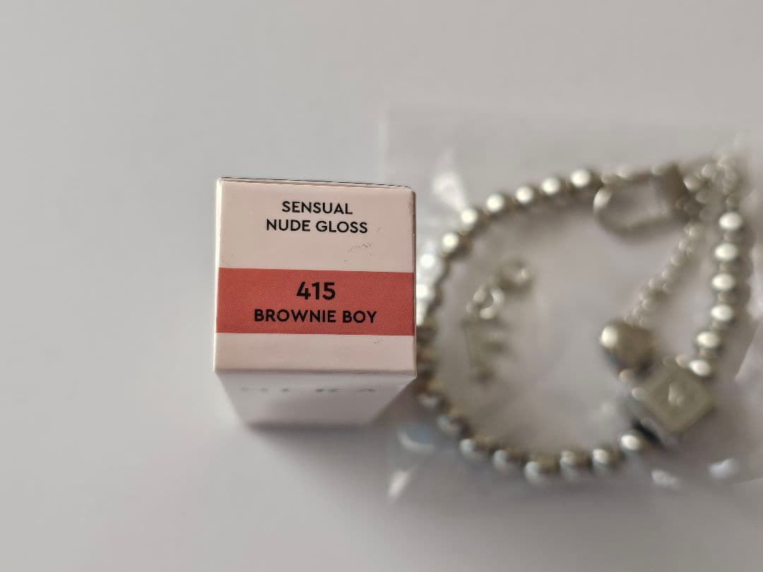 リップグロス HERA SENSUAL NUDE GLOSS 415 BROWNIE BOY