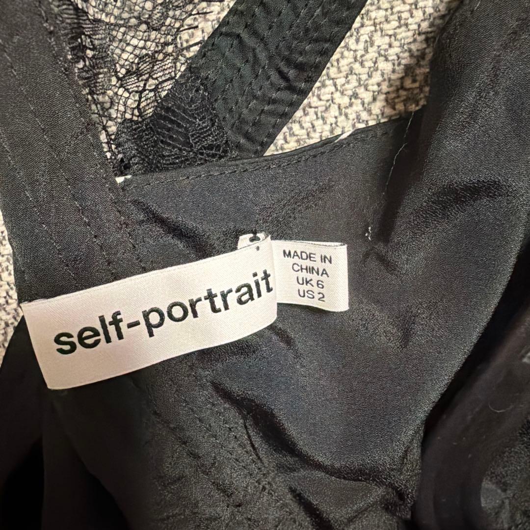 セルフポートレート　バックリボン花柄レース付きスリーブレスドレス