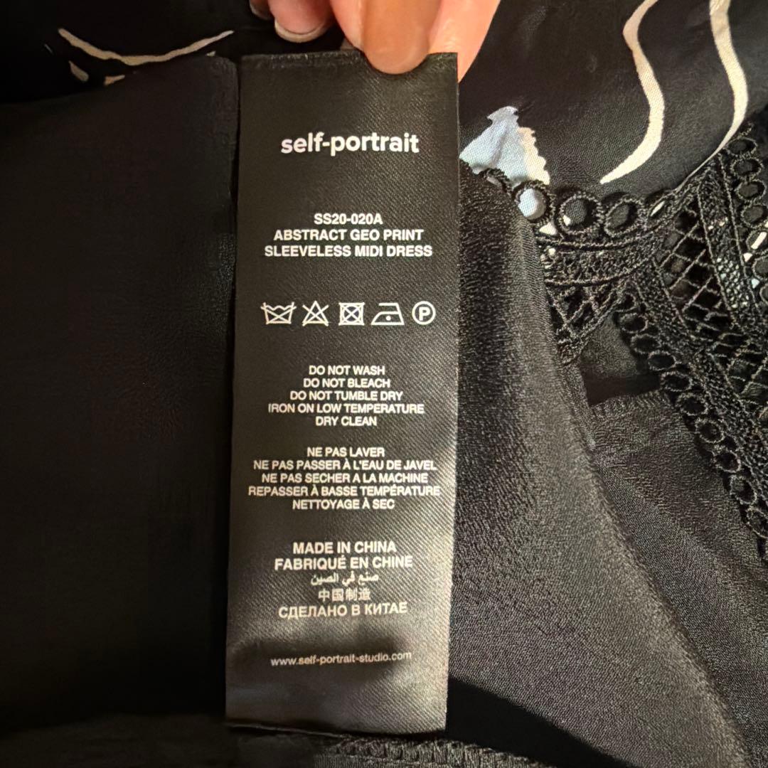 セルフポートレート　バックリボン花柄レース付きスリーブレスドレス