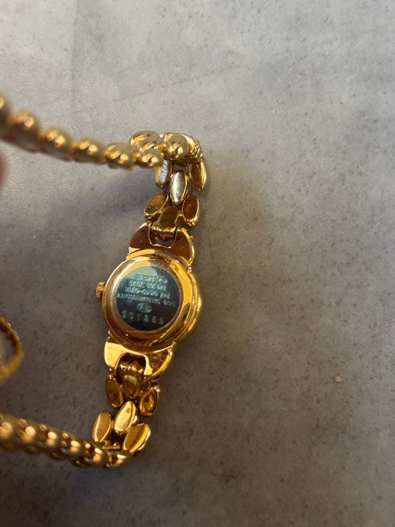 SEIKO セイコー レディース腕時計 1E20-0770 ゴールド ルビー装飾