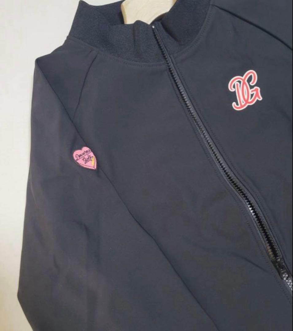 新品未使用【デヴァロー ゴルフ】レディース バッグプリントリップブルゾン 黒 Ｍ