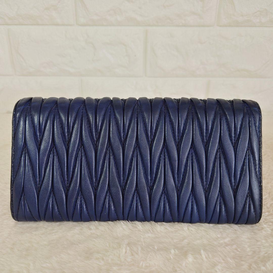 miu miu マテラッセ ネイビー 二つ折り長財布 5M1109
