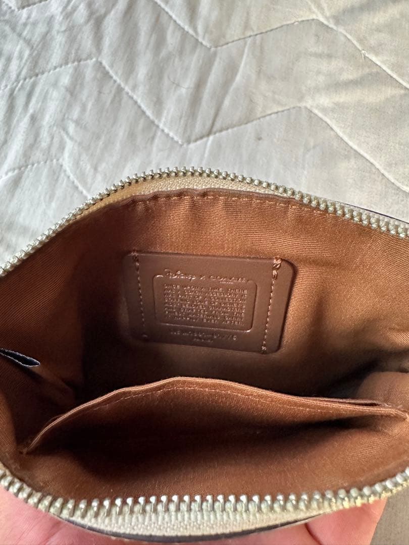 COACH ポーチリストレットダンボディズニー