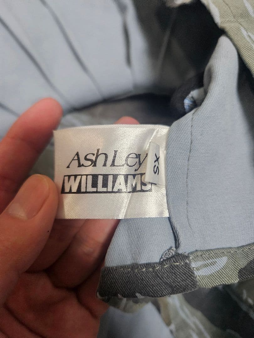 スカート ASHLEY WILLIAMS CAMO PLEAT MICRO SKIRT