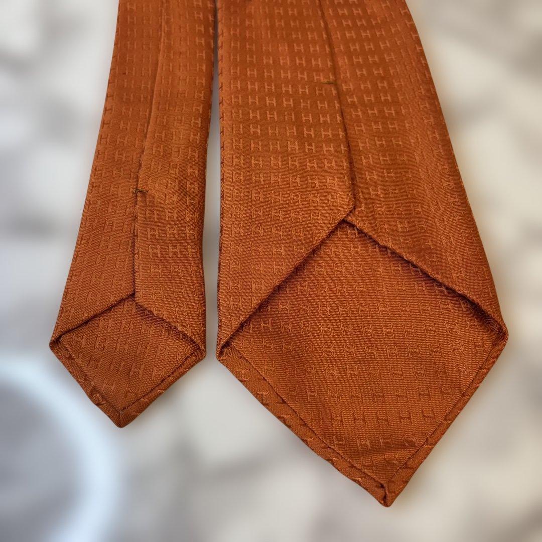 【極美品✨】HERMES ネクタイ　オレンジ　ファソネ　H柄　総柄　刺繍　人気