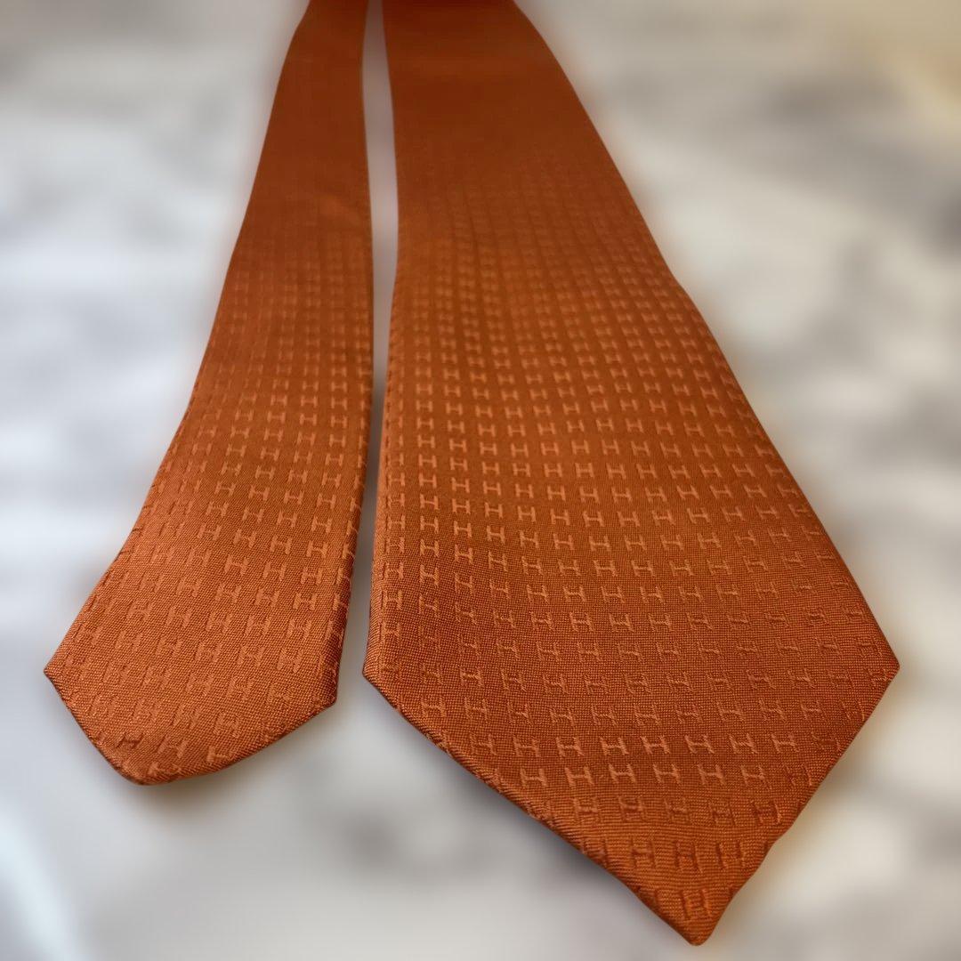 【極美品✨】HERMES ネクタイ　オレンジ　ファソネ　H柄　総柄　刺繍　人気