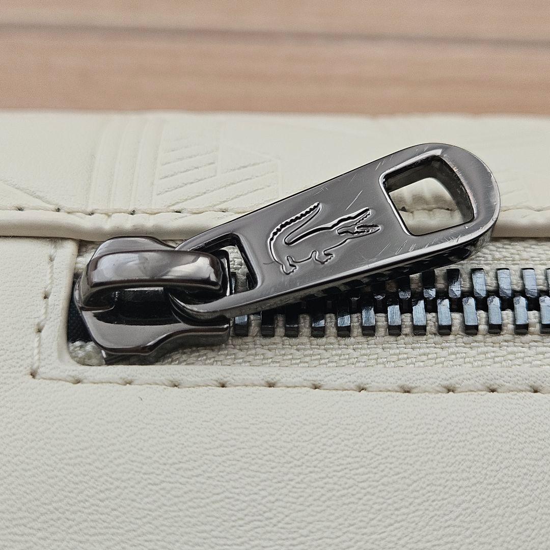 LACOSTEラコステ モノグラムスモールメッセンジャーバッグ アイボリー