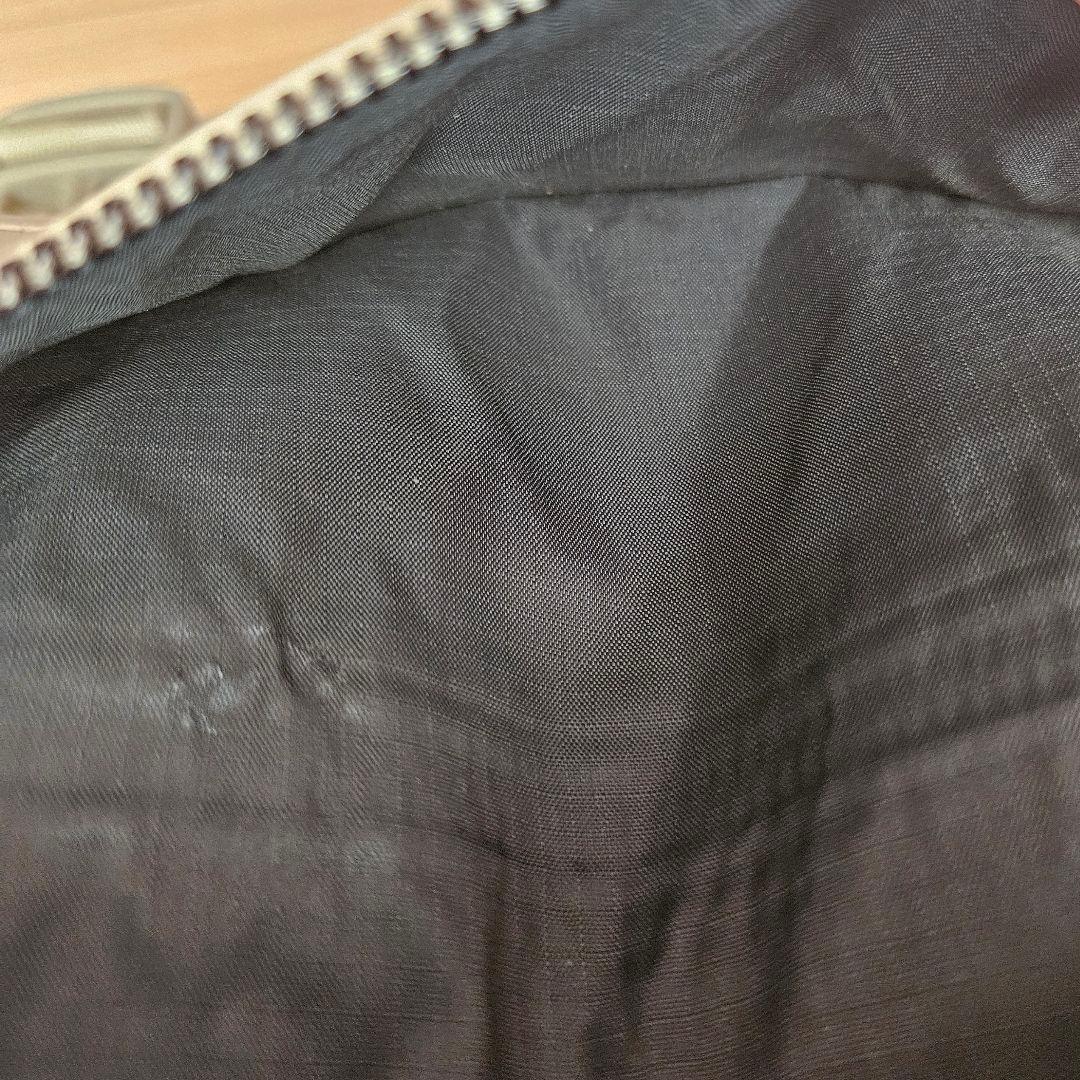 LACOSTEラコステ モノグラムスモールメッセンジャーバッグ アイボリー