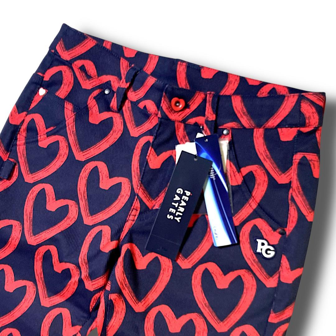 定31900円 1 パーリーゲイツ 落書きハート柄 ストレッチ ロングパンツ 紺