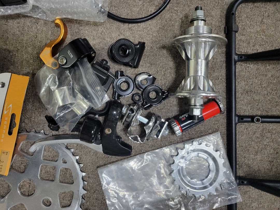 車輪掛け、ハンドルグリップ、自転車持運びカバー、ツェーン