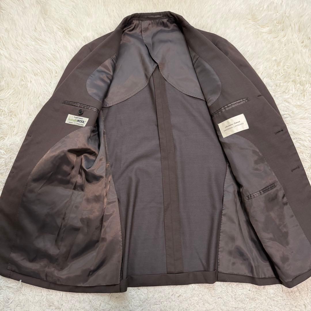 近年極美品XLサイズ相当　ユニバーサルランゲージ　sustaina スーツ