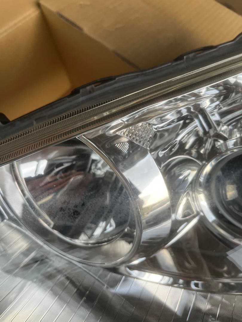 NHP10 アクア 左ヘッドランプ