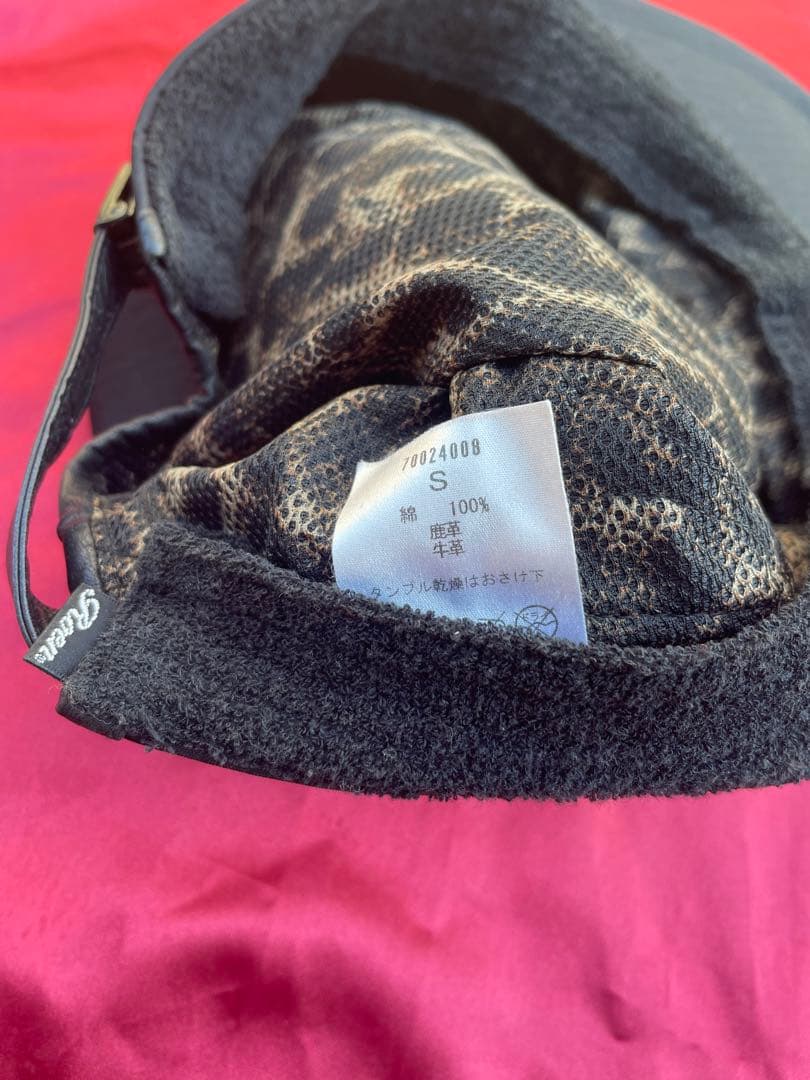 ROENキャスケットスカルレザーパッチスタッズチェーンロエン