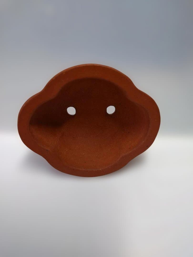 オレンジ色の脚付き小品盆栽鉢