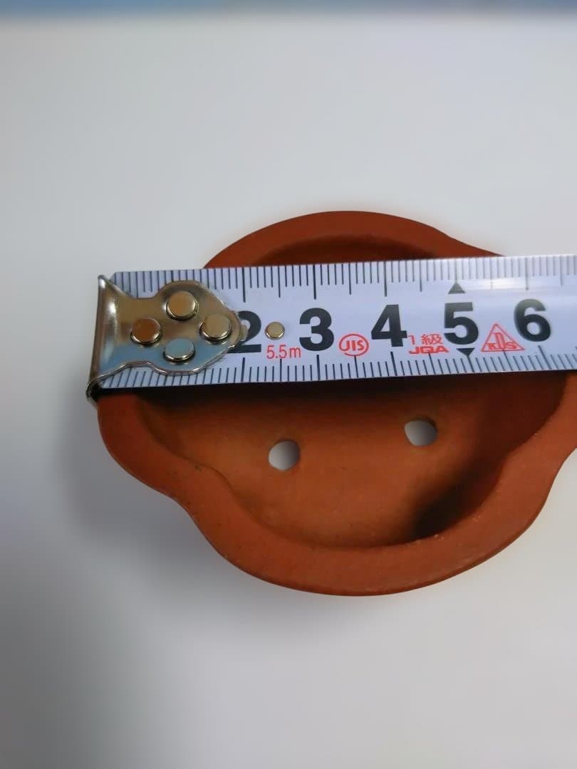 オレンジ色の脚付き小品盆栽鉢