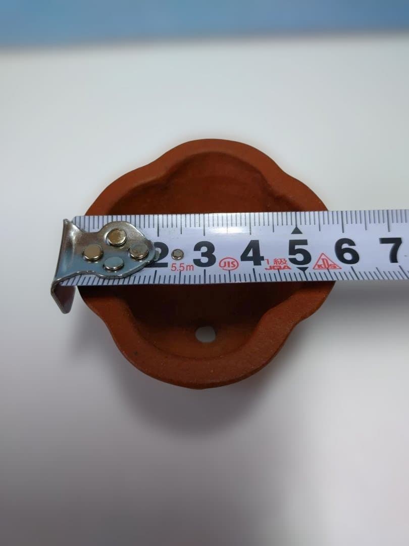 オレンジ色の脚付き小品盆栽鉢