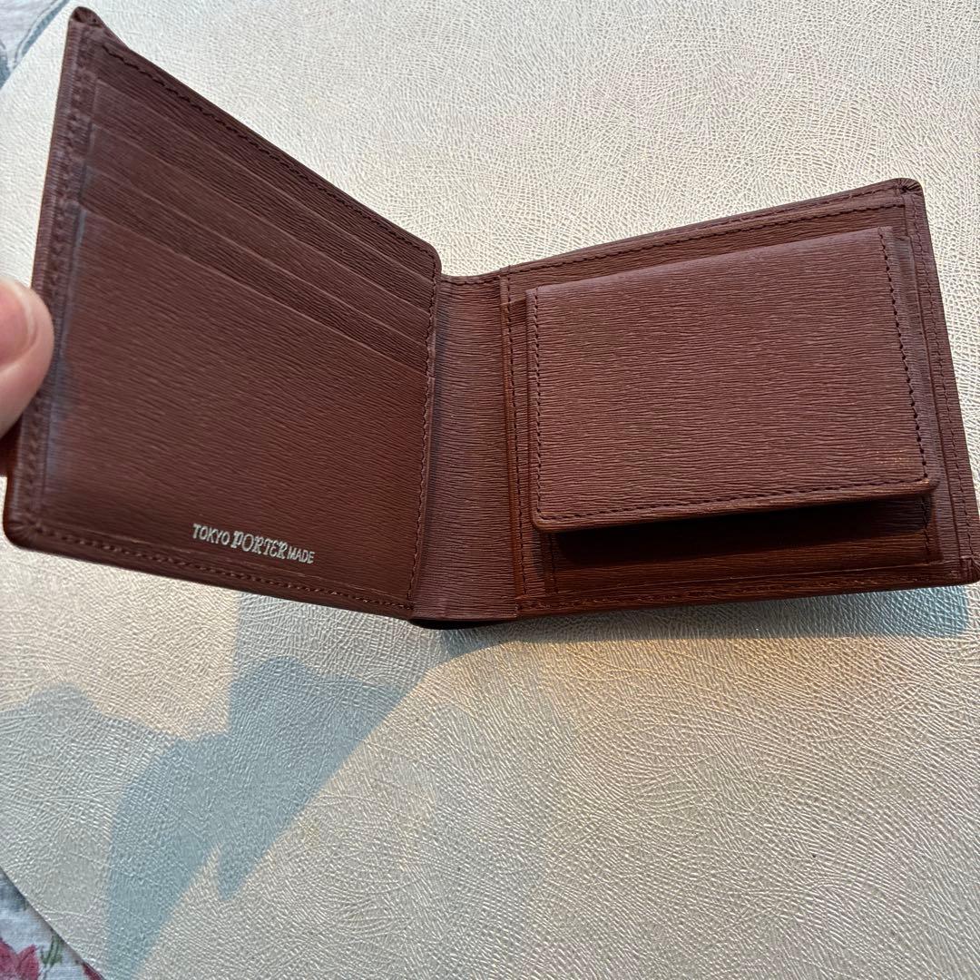 Porterブラウン エンボス加工レザー 二つ折り財布