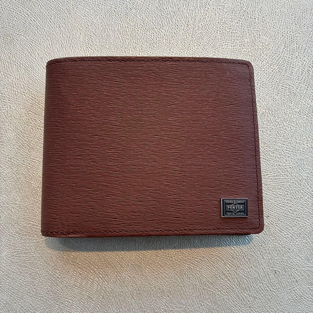 Porterブラウン エンボス加工レザー 二つ折り財布