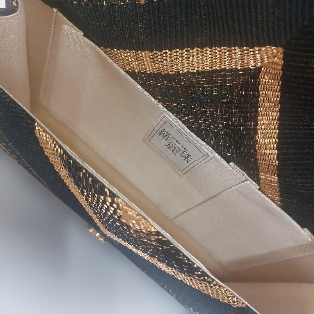 MIKIMOTO 黒と金のチェック柄クラッチバッグ 新品　値段を下げました。